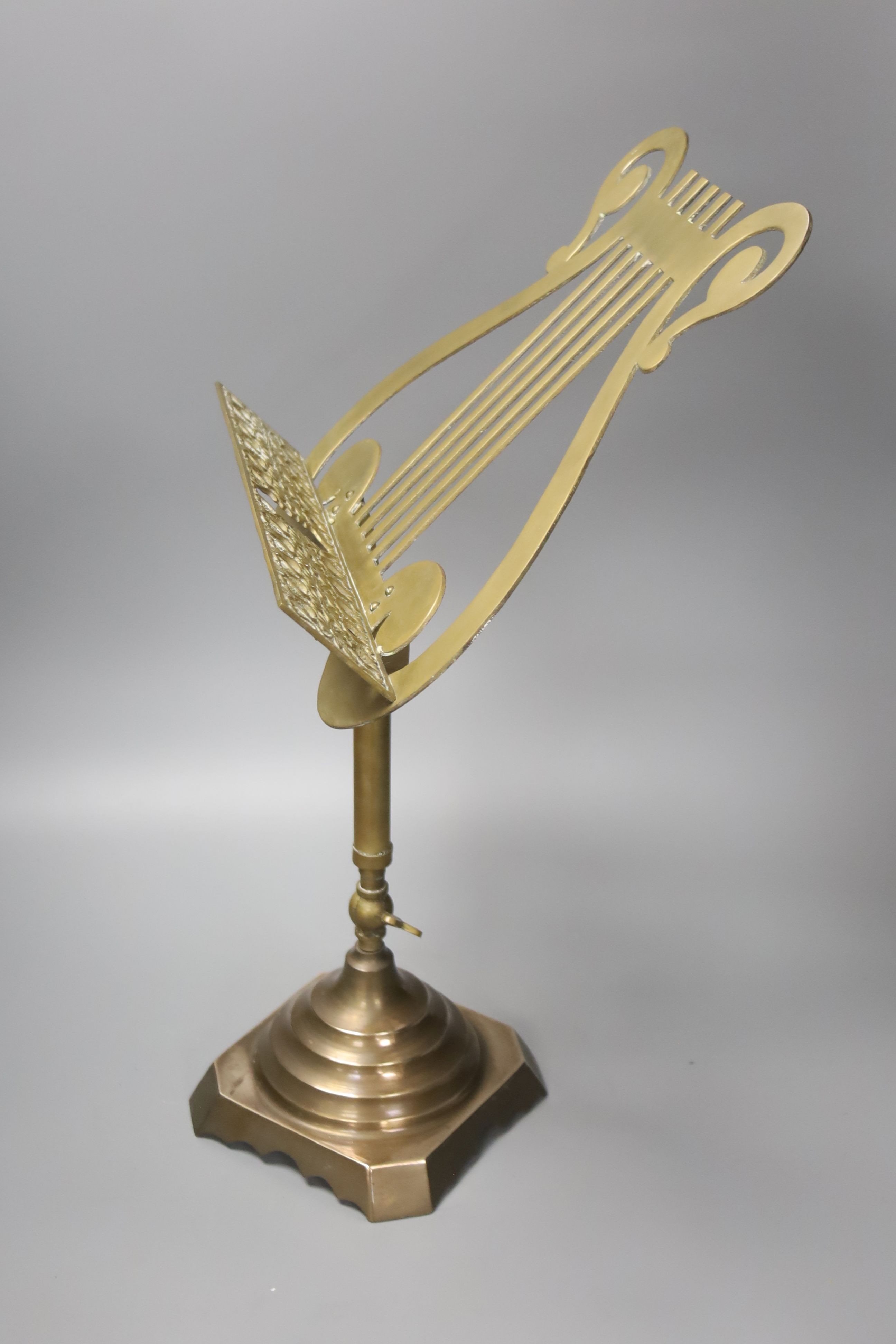 A brass and copper music stand 51cm